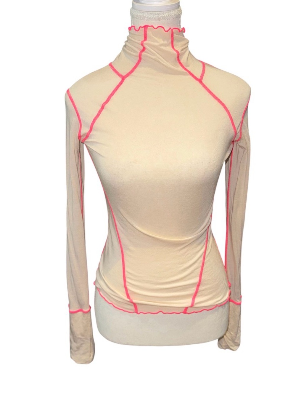 Sheer long sleeve high mock neck top with hot pink detailing